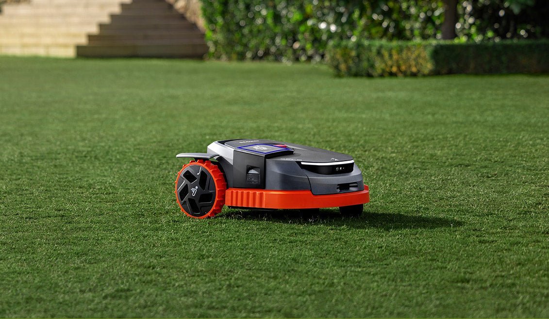 Navimow robotic mower on a manicured lawn
